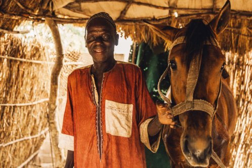 Ablaye Cor with his horse in Badoudou Village, Senegal