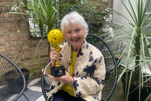 Annette Badland with charity's film award trophy