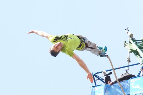 man bungee jumping